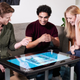 Up to six players can crowd around the Infinity Game Table at once, but online multiplayer means they don’t necessarily all have to be under the same roof.